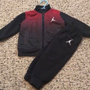 Jordan baby boy jump suit 12 mths